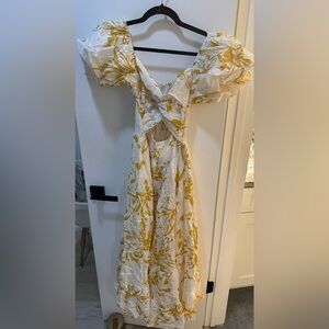 Showpo Pink Diamond - SHORT PUFF SLEEVE FRONT CUT OUT DRESS IN WHITE FLORAL